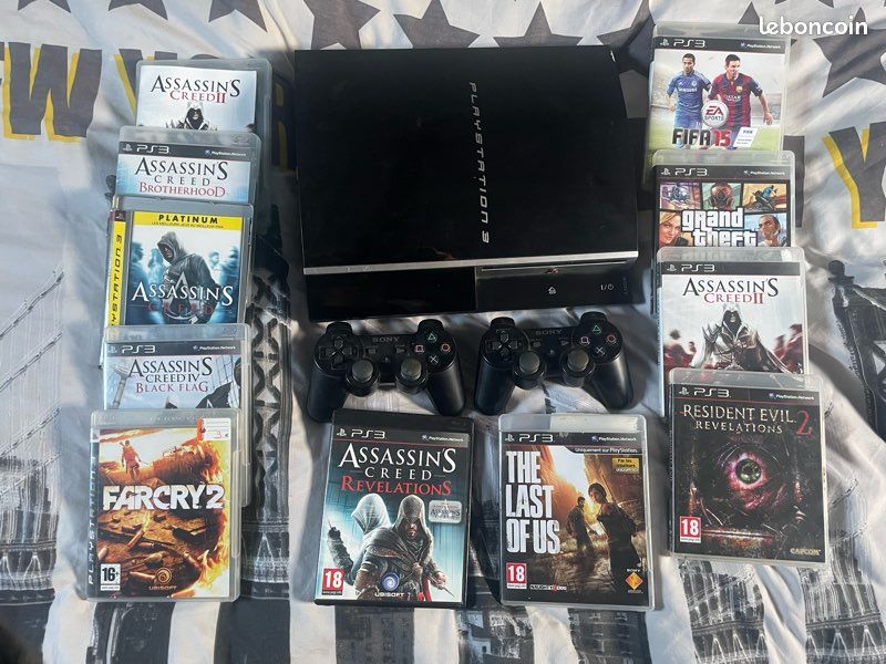 PS3 + 2 manettes + jeux (image 1)