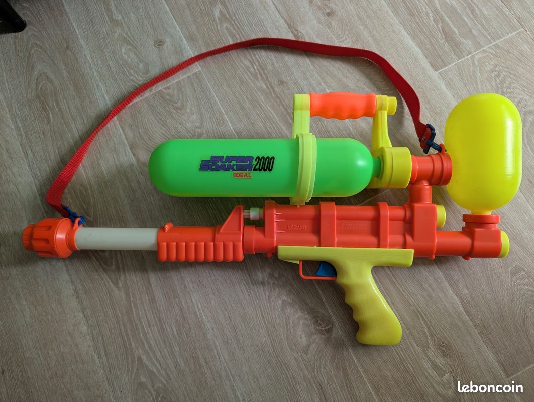 Nerf Super Soaker DinoSquad, Blaster à Eau Raptor-Surge actionné par la détente, Jeu d'eau extérieur d'été F2795 Multicolore