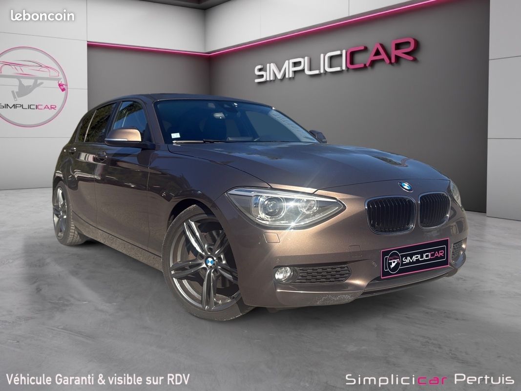 BMW SERIE 1 F20 125i 218 ch bva8 Lounge Plus Radars avants arrières entretien complet BMW Garantie 12 mois (image 1)