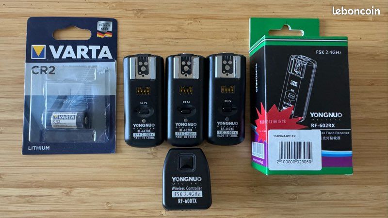 Yongnuo Transmetteur et 4 récepteurs pour flash (image 1)