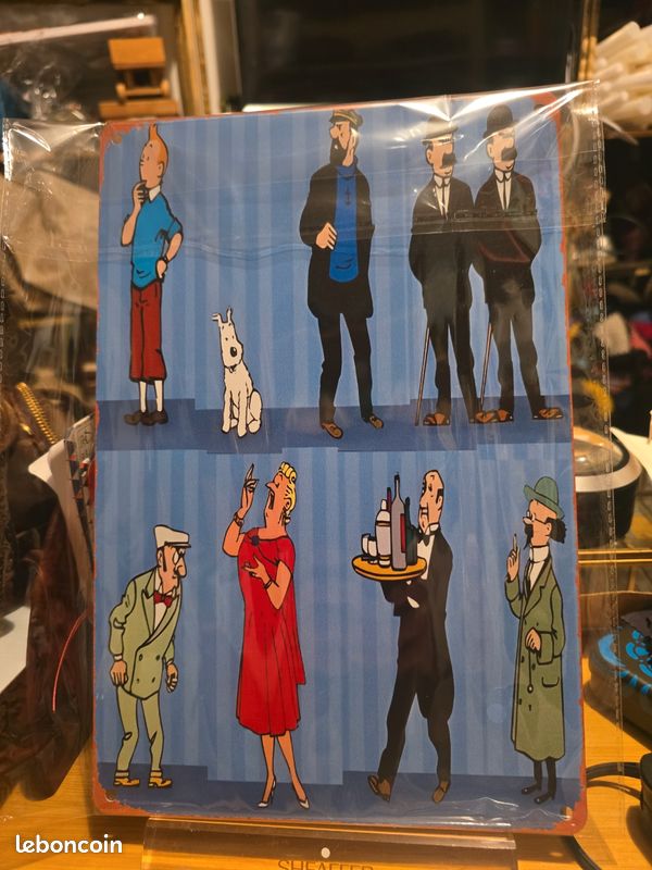 Figurine Tintin et avion de course bleu
