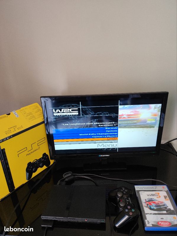 PS2 en boîte et jeu (image 1)