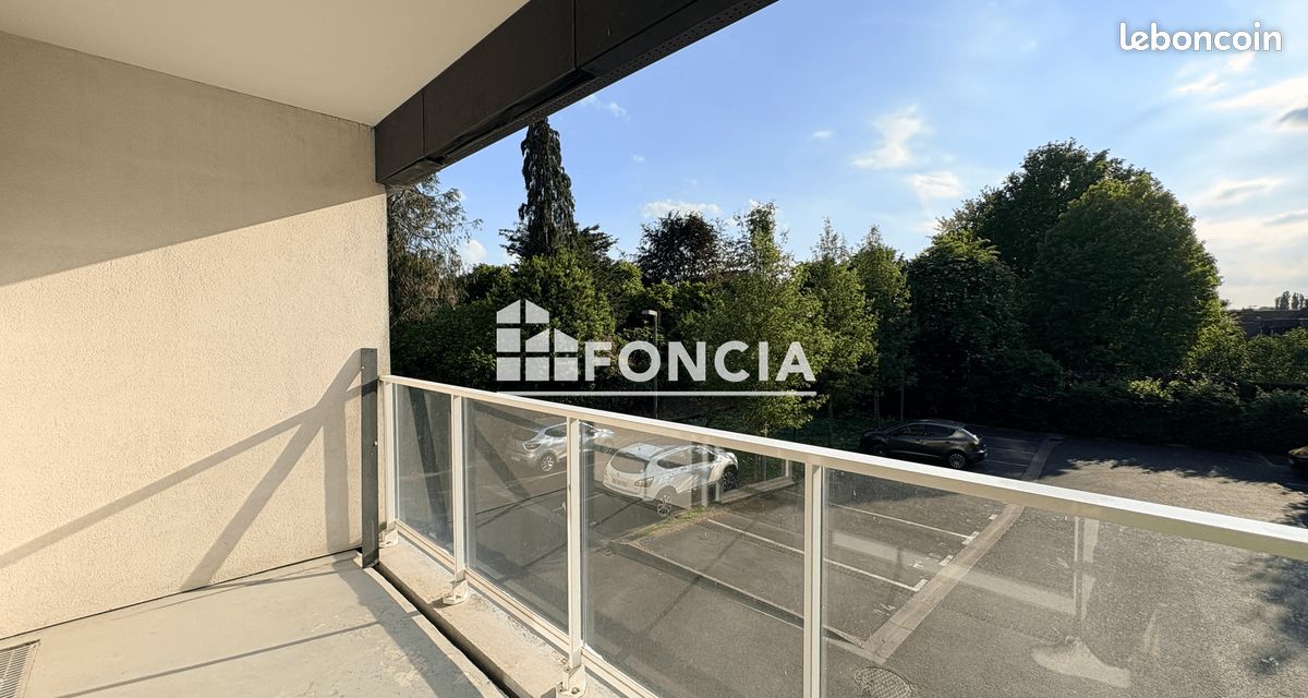 Appartement T3 avec balcon et parking privatif (image 3)