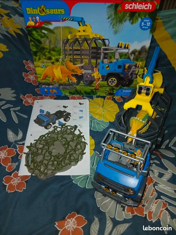 Lot de jouets dinosaures : livres, dinosaures, camion transporteur schleich,... (image 2)