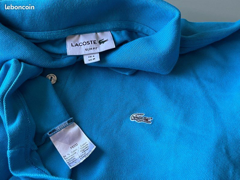 Polo Lacoste bleu taille 4/M slim fit Vêtements