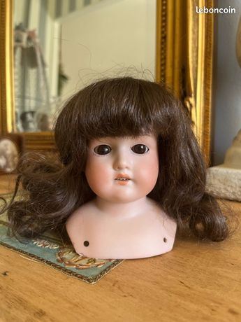 Tete porcelaine dans poupées anciennes