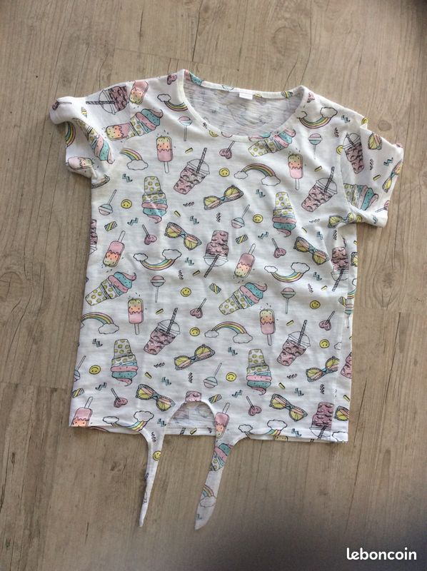 Tee shirt blanc motifs pastel a noué 14 ans (image 1)