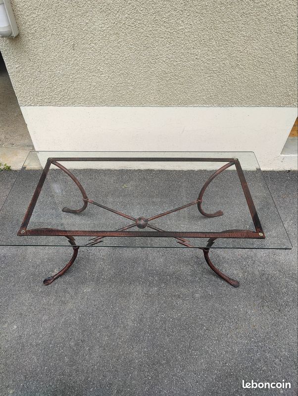 Table basse en verre et pieds en fer forgé (image 1)