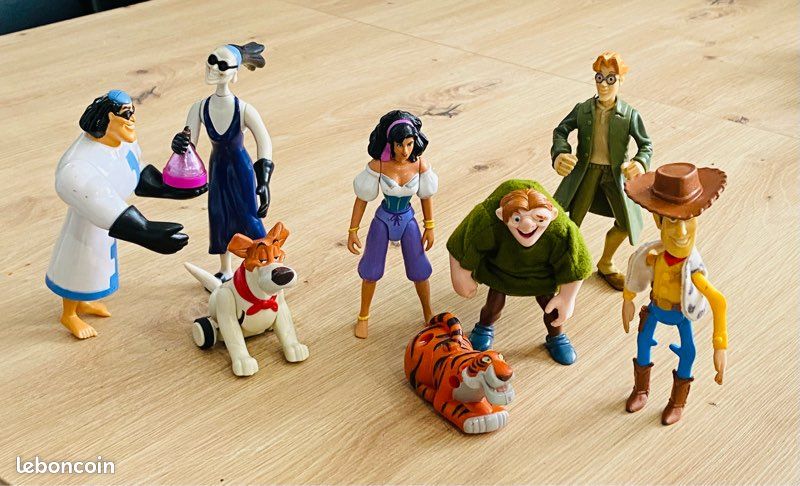 = Lot 8 Figurines Disney, Pocahontas, Woody, Le Bossu de Notre Dame, Dodger, Shere Khan et autres, années 90 = (image 3)