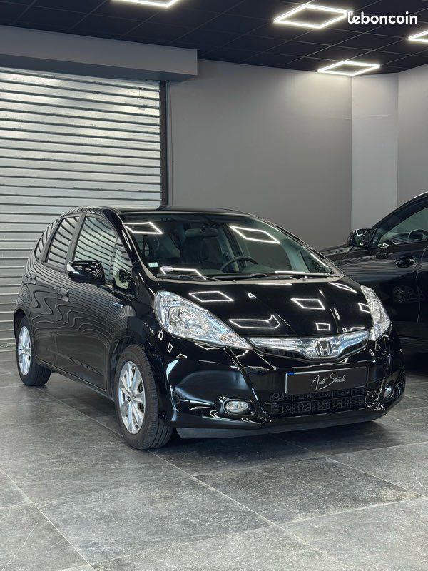 Honda Jazz 1.3 Hybrid Luxury BOÎTE AUTO - PREMIÈRE MAIN - CARPLAY - Garantie 12 mois (image 1)