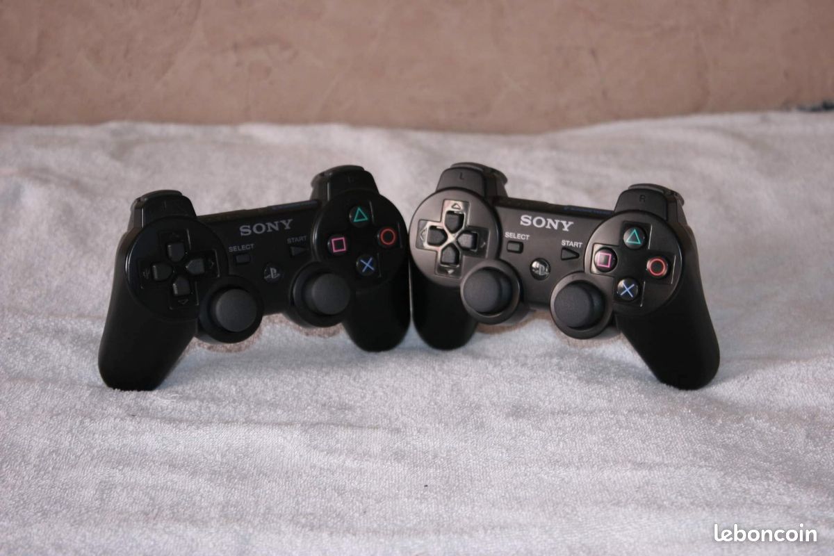 Manettes PS3 Sony officielles – Sixaxis DualShock 3 sans fil+Vibration (image 1)