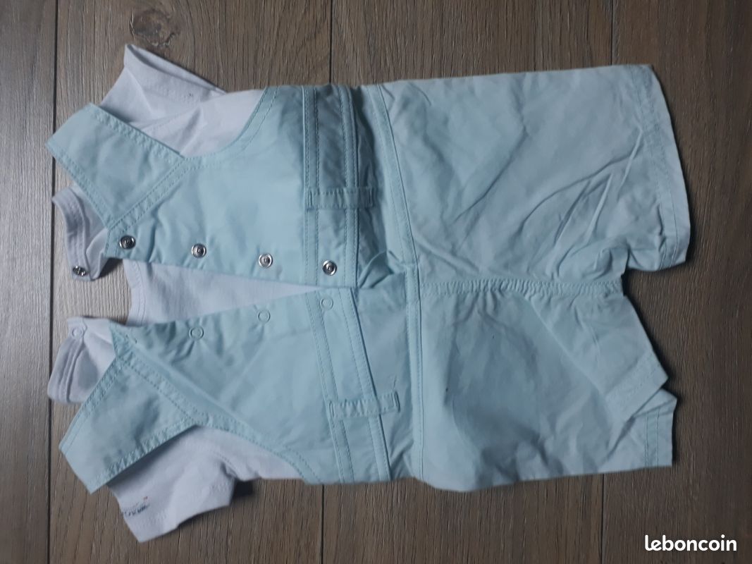 Salopette short
Jamais porté juste lavé
Couleur vert d'eau, bleu clair
Avec dessin de bateau
Très léger avec faux tee shirt intégré
Idéal pour l'été
Boutons pressions dans le dos et à l'entrejambe (image 2)