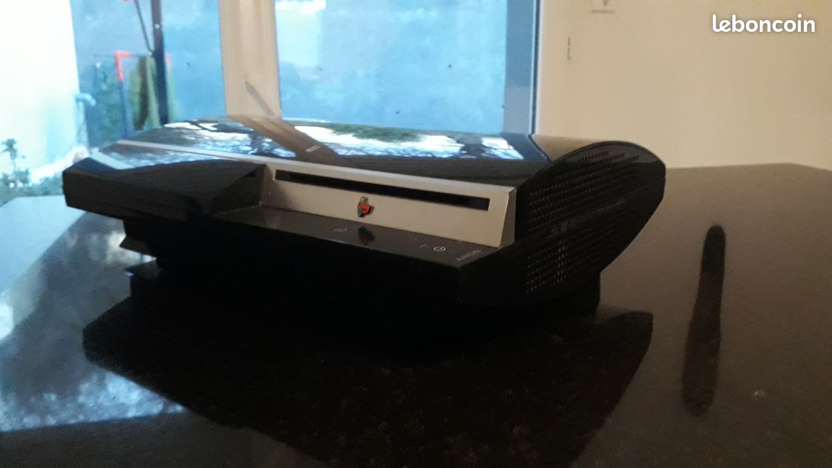 Playsation 3 (128 Go) + 5 manettes Dualshock 3 + 10 Jeux (image 1)