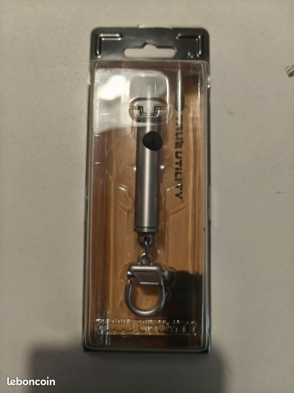 Porte clés avec lampe torche intégré neuf (image 1)