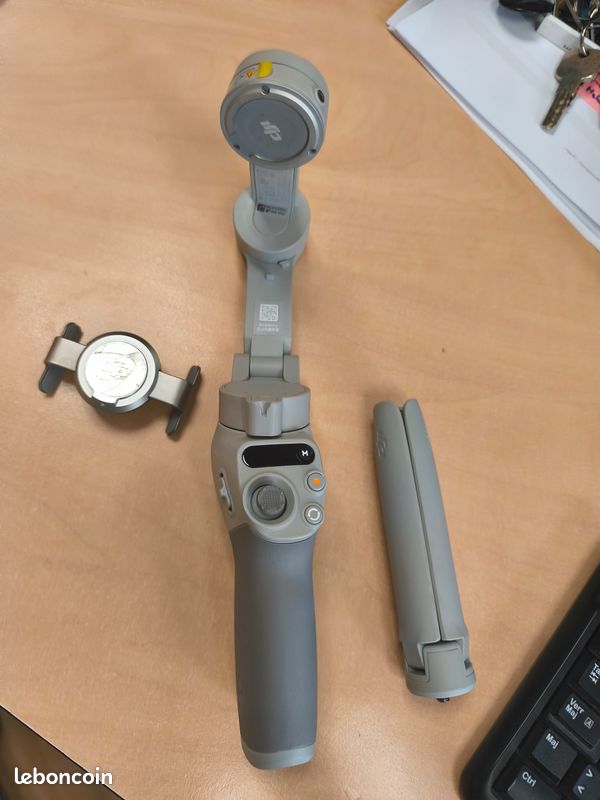 ( Prix négociable * ) DJI OM 4 SE > Stabilisateur smartphone 3 axes en très bon état (image 1)