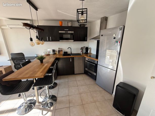 T2 avec garage et piscine