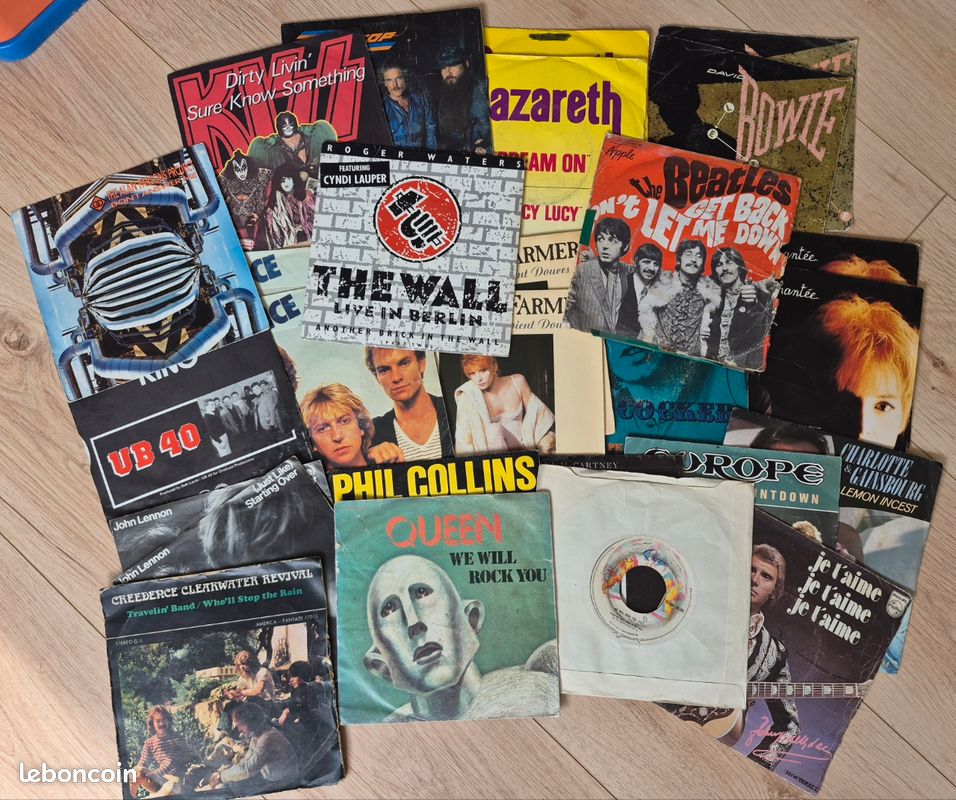 Lot de 27 vinyles 45T QUEEN, Creedence clearwater revival, Beatles, David Bowie... (image 1)