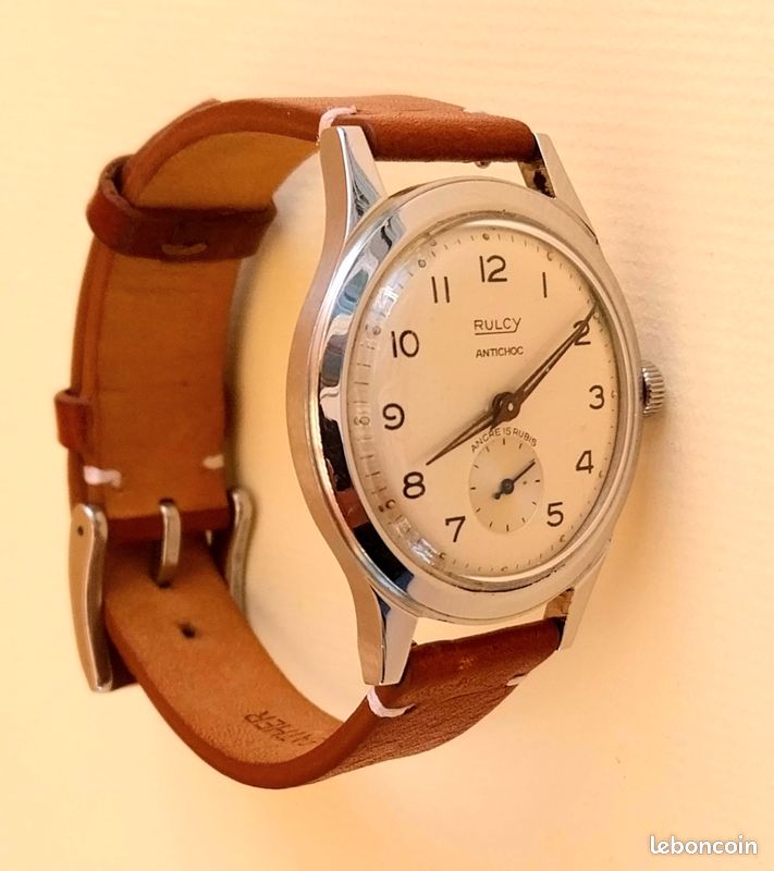 Montre Mécanique Vintage RULCY 108 - Mouvement ETA 1080, Boîtier Chromé Argenté, Cadran Argenté, Bracelet Cuir Marron, Années 1950