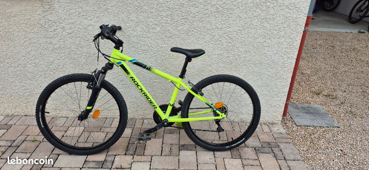 VTT ENFANT ROCKRIDER ST 500 24 POUCES 9-12 ans Jaune Fluo