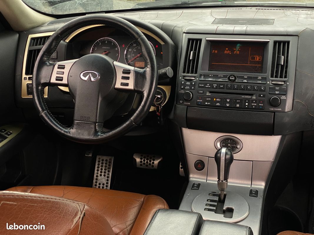 INFINITI FX35 / 3.5i V6 AWD 280 cv / Éthanol / Boîte auto / Toit ouvrant / Sièges chauffants / Son BOSE / Climatisation bi-zone (image 7)