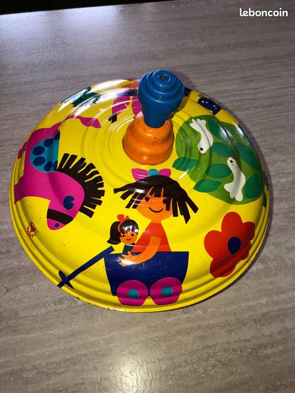 Ancienne toupie à tourner en parfait état de fonctionnement