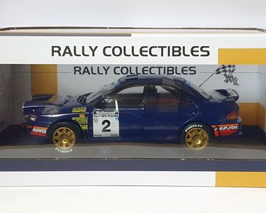 Sunstar Subaru Impreza 555 #2 – McRae Vainqueur NZ 1994, échelle 1/18, Nuit, Neuf