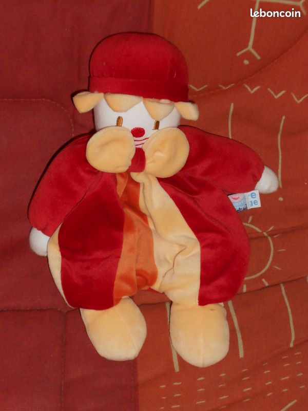 Doudou clown jaune orange rouge sucre d'orge de 30 cm (image 1)