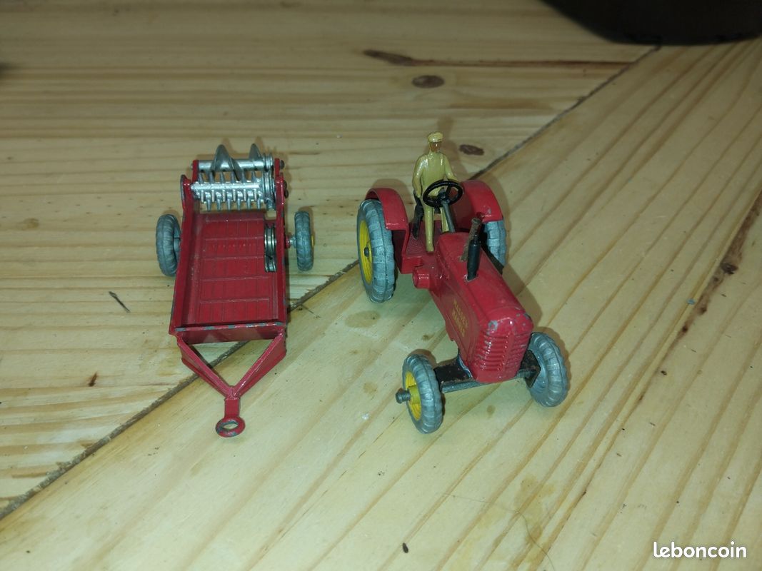 Dinky Toys Massey Harris Tractor with two spreaders No. 27C and No. 321 and a flat deck trailer
