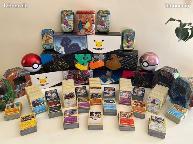Lot de 200 cartes Pokémon + boîte de rangement (différents modèles) lire l’annonce PETIT PRIX (image 1)