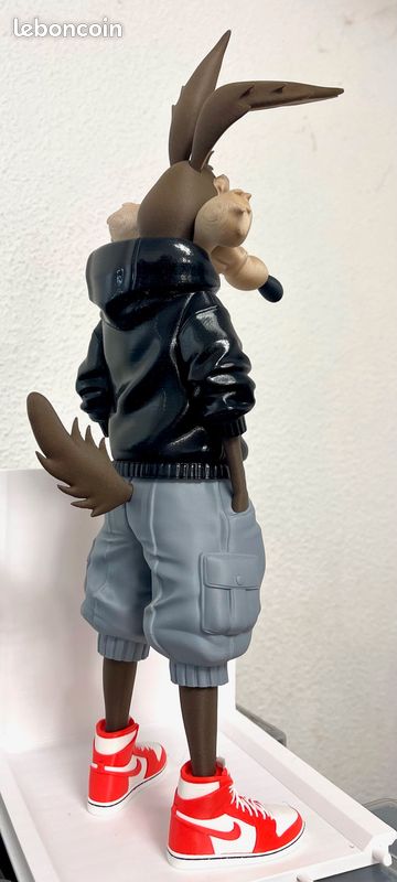 Figurine Coyote sur sa fusée rocket - Warner Bros