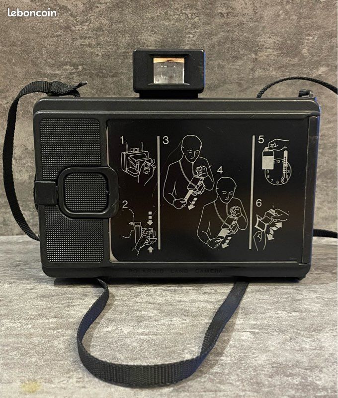 Polaroid EE100 Kamera – Foto Köberl – Secondhand