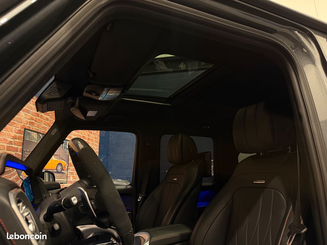 Mercedes benz classe g63 4.0 585 v8 4-matic + amg suivi mercedes - volant carbone - caméra 360° - toit ouvrant - ecran arriere mbux - carplay - pack interieur manufaktur - attelage - immat france (image 19)