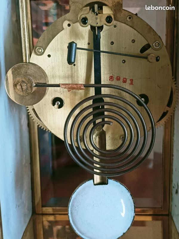 Comment régler un pendule ancien pour qu'il fonctionne correctement