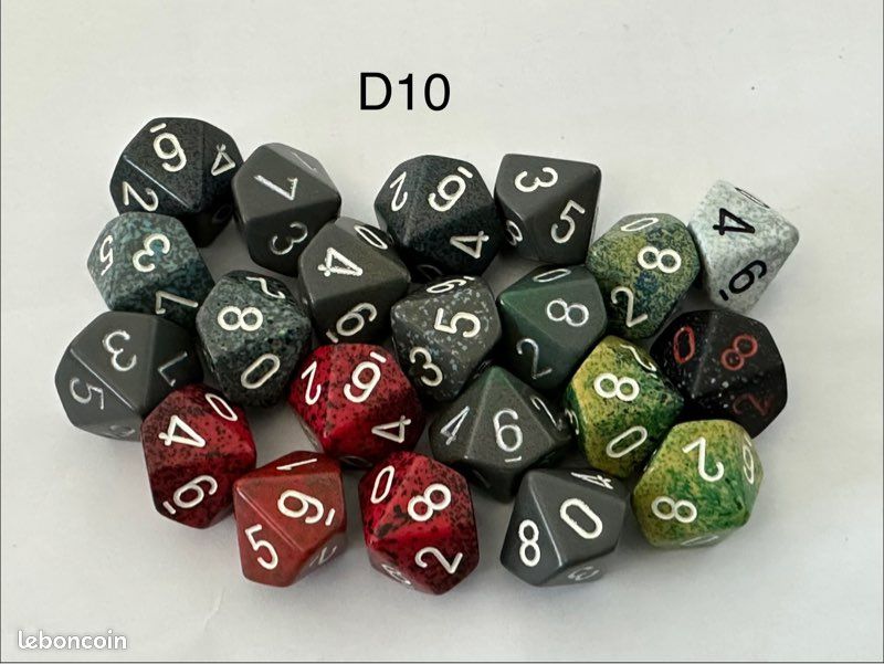 Dé effet turquoise et argenté pour jeux de rôle ou société chessex