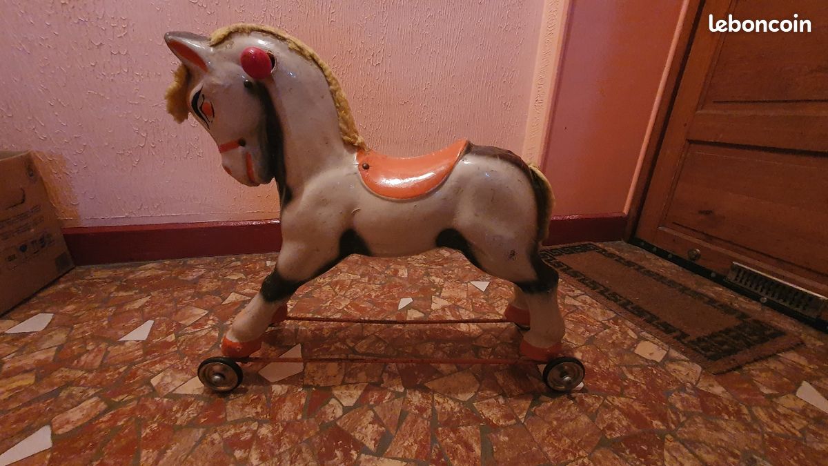ation Cheval à bascule et roulettes