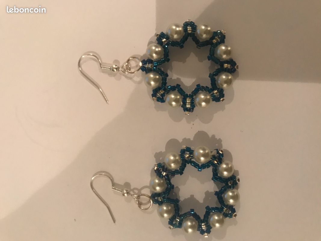 Boucles d'oreilles pendantes Flocon étoilé (image 1)