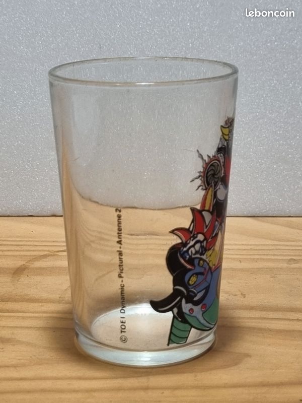 Goldorak - Verre à moutarde Amora - Goldorak poursuivi par un Golgoth