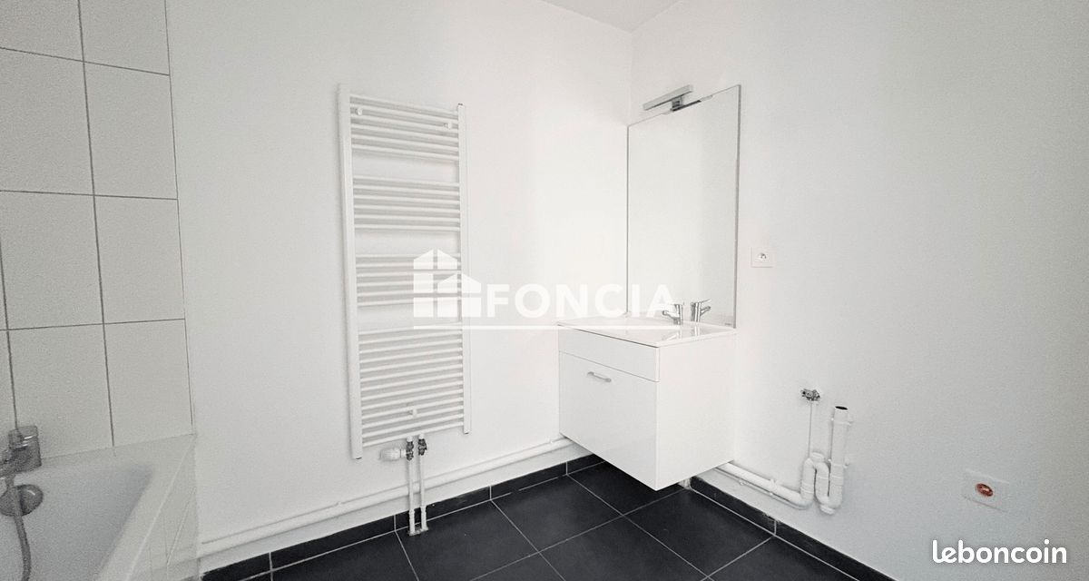 Appartement T3 avec balcon et parking privatif (image 9)
