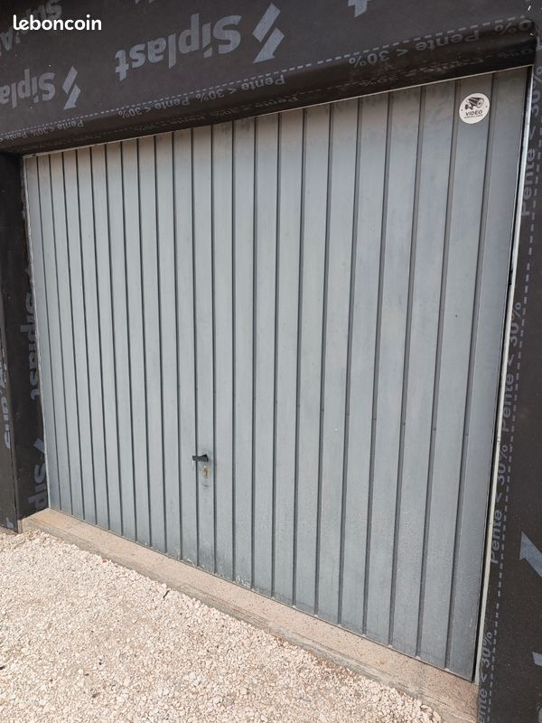 Porte garage bon etat (image 1)