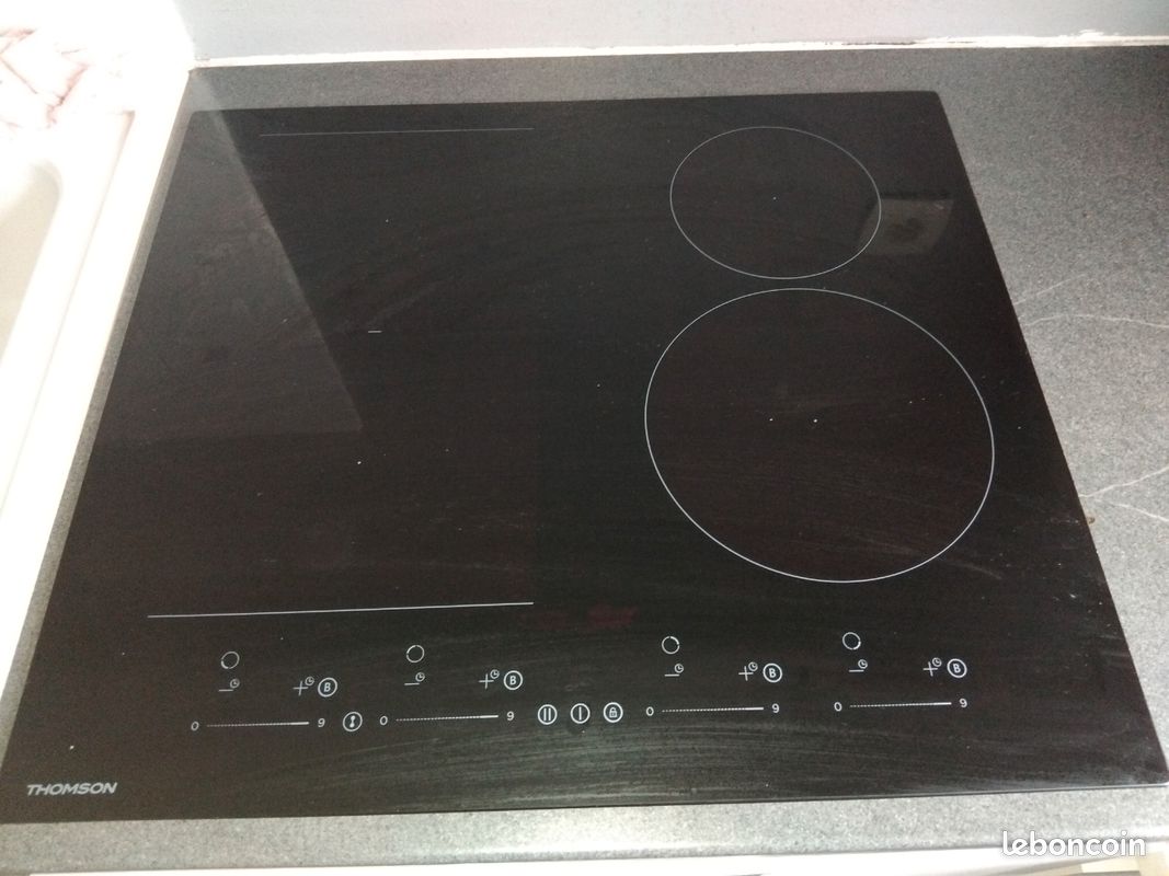 Table induction SOUS GARANTIE Thomson THIH4FLEX (image 1)