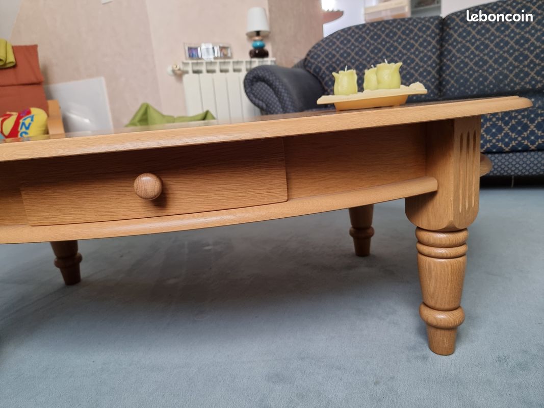 Table basse ovale en chêne clair (image 1)