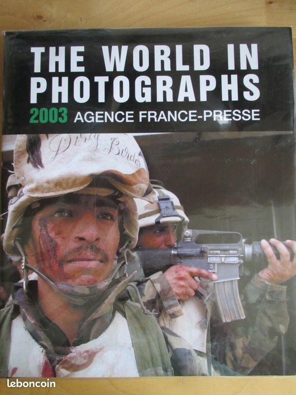 THE WORLD IN PHOTOGRAPHS AGENCE FRANCE PRESSE 2003 (ref biblio 6636) (image 1)