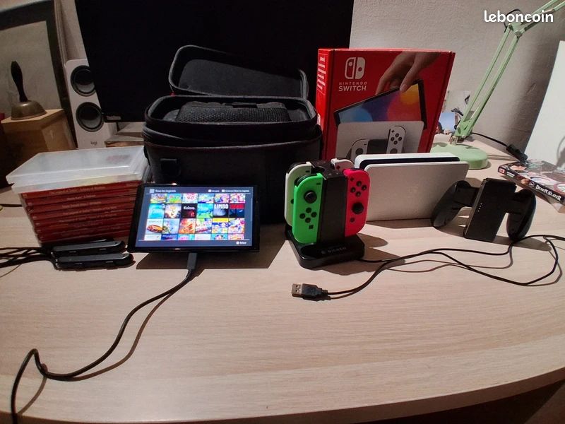 Nintendo Switch OLED + jeux (image 1)