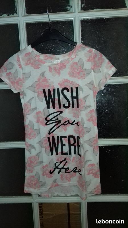 Tee shirt femme fleuri taille. XS (image 1)
