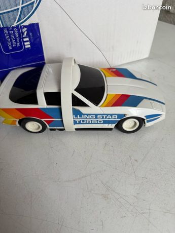 Ancien jouet tôle mécanique voiture Stunt Car cascade boîte