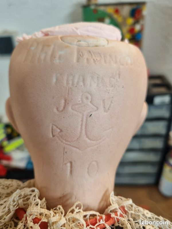 Jules VERLINGUE. Poupée tête en biscuit marqué en creux Pet