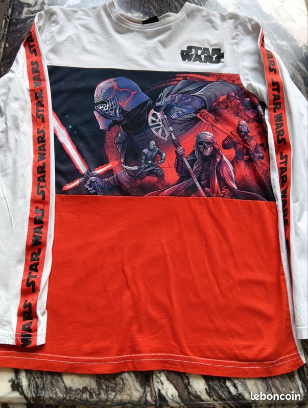 Promo Tee-shirt Garçon Spiderman Ou Star Wars chez Auchan