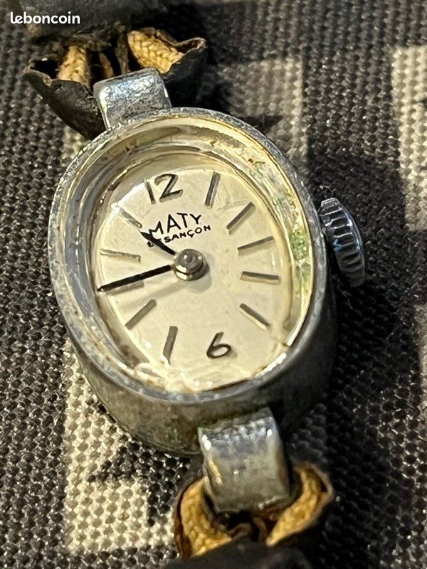 Montre Mécanique Besançon Femme - Cadran Bleu, Boîtier Argenté - Occasion