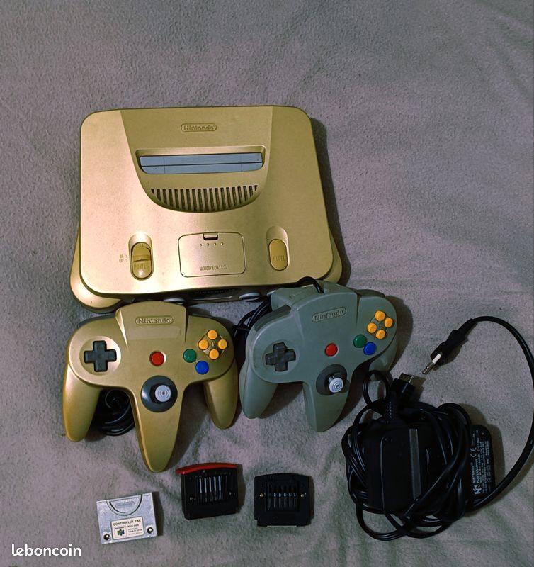 Lot Nintendo 64 Gold Japonais, alimention EU220v + 27 jeux + manettes collector (Gold + Officielle grise+ accessoires complet (image 1)