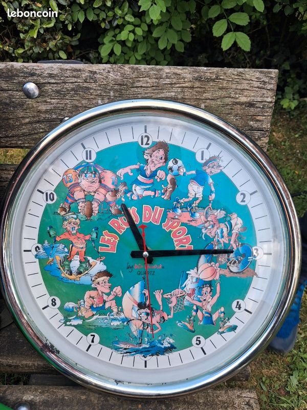 Grand horloge métal les rois du sport (image 1)